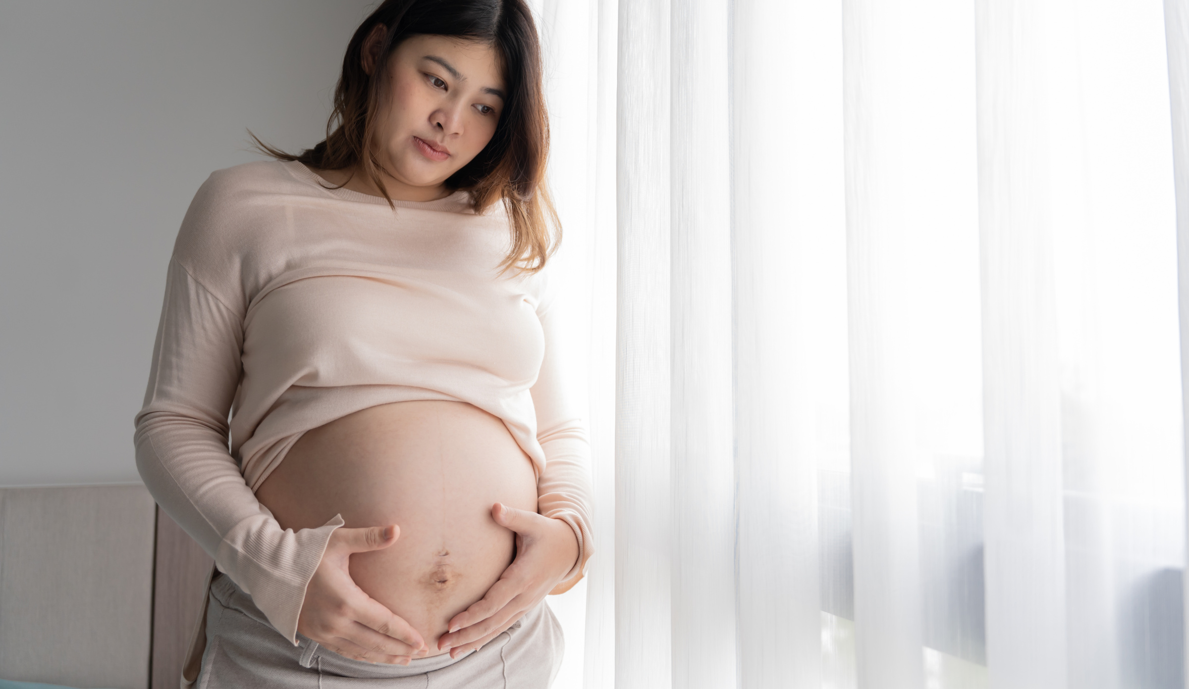 worried pregnant woman concerned and anxious woman in pregnancy